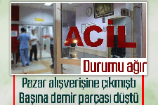 Pazarda başına demir düşen kadın ağır yaralandı