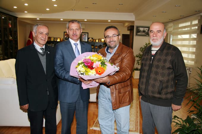 Kalyoncular'dan Başkan Dişli'ye davet