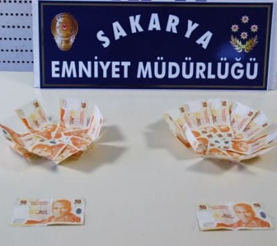Sahte Parayla Alışveriş Yapan 2 Kişi Yakalandı
