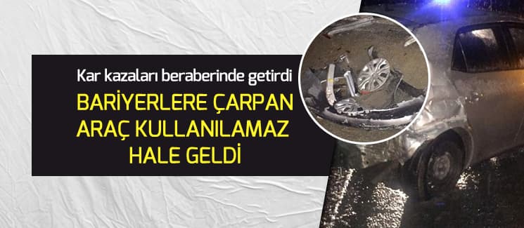Karda kayan otomobil bariyerlere çarparak durabildi