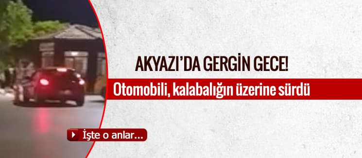 Otomobili, kalabalığın üzerine sürdü