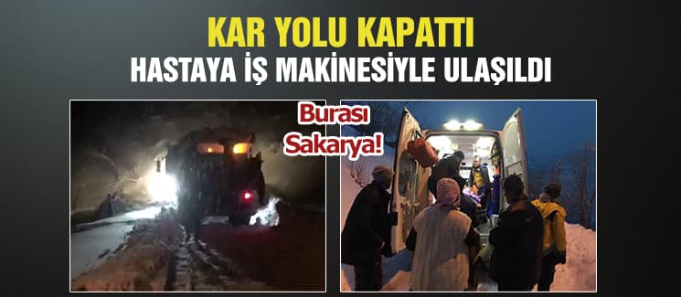 Kar yolu kapattı; Hastaya iş makinesiyle ulaşıldı