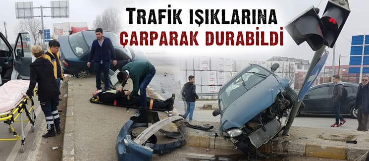 Trafik ışıklarına çarparak durabildi