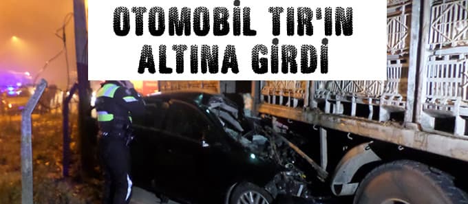 Otomobil TIR'ın altına girdi