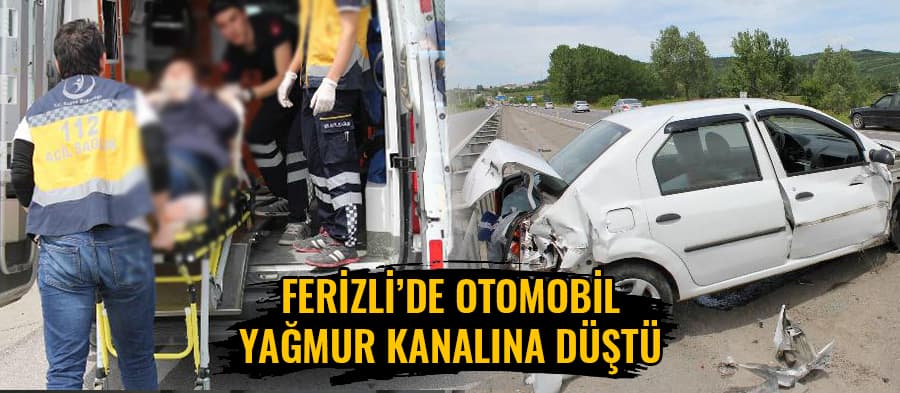Otomobil yağmur kanalına düştü