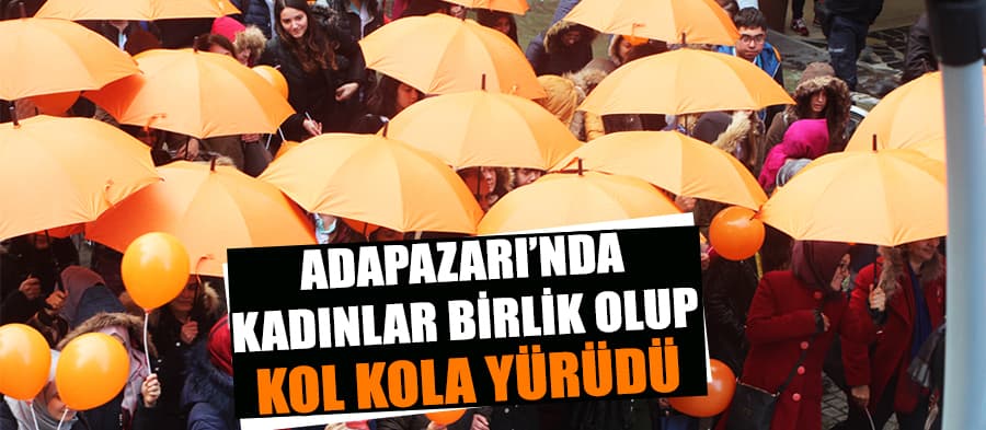 Şiddete tepki olarak turuncu şemsiyelerle yürüdüler