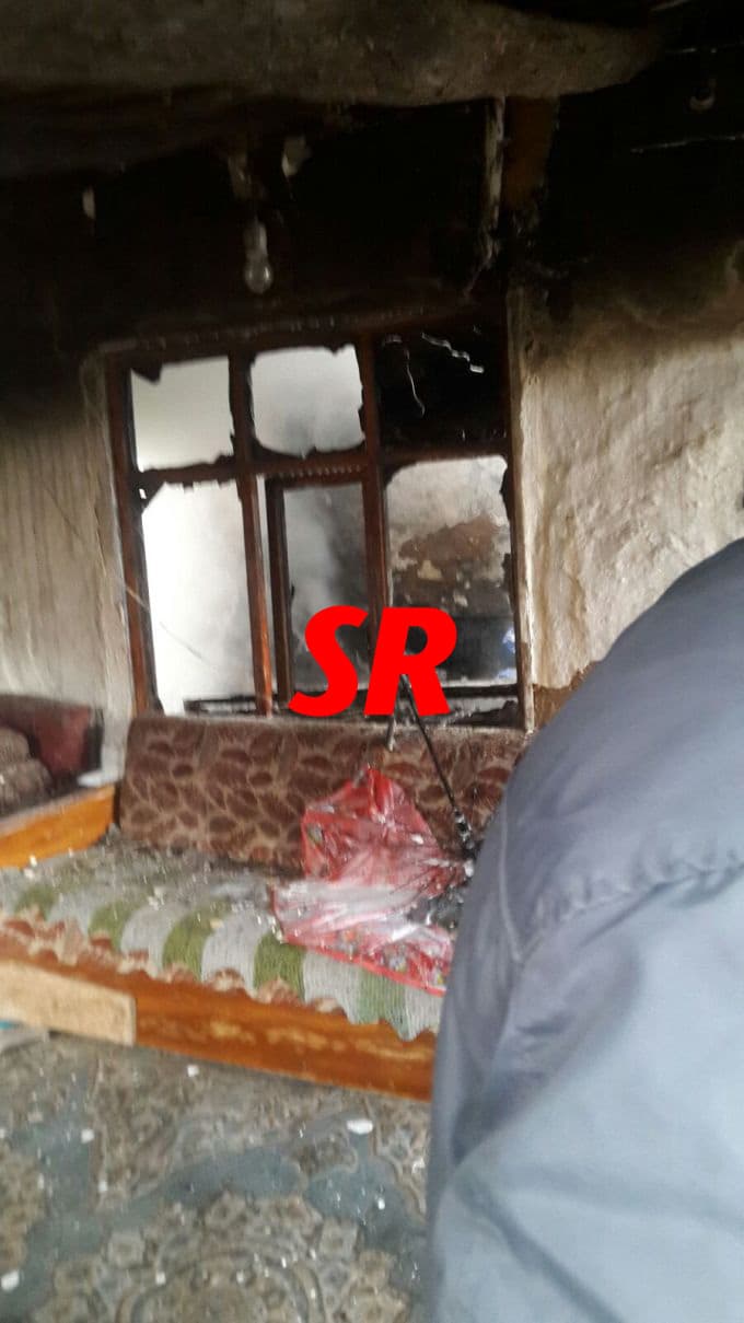 Yanan eve girip yaşlı kadını kurtardı