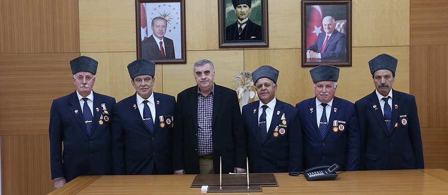 Toçoğlu, şehit yakınları ve gazilerle buluştu
