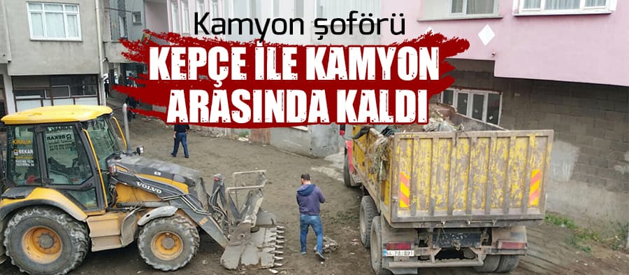 Kamyon ile kepçe arasında kaldı
