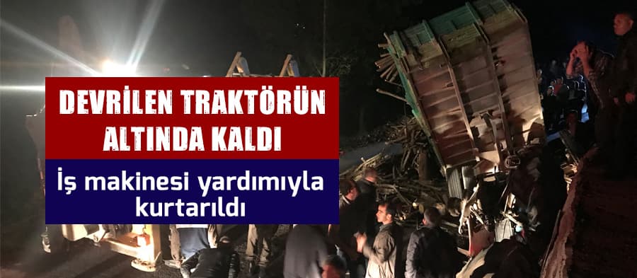 Traktörün altında sıkışan sürücüyü iş makinesiyle çıkardılar