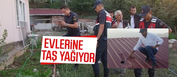 Evlerine taş yağıyor